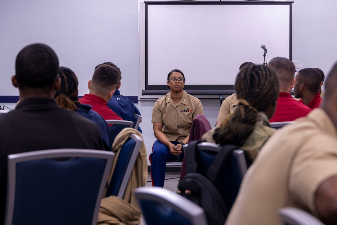 U.S. Marine Corps Maj. Krysta Porter Lot, a policy analyst for Reserve Affairs Division, Manpower and Reserve Affairs, answers a question during the panel portion of the Marine Corps Leadership Seminar at Howard University in Washington, D.C., on April 21, 2023. MCLS develops greater connectedness between the Marine Corps and local university community to attract top talent for Marine Corps officer (and enlisted) programs. (U.S. Marine Corps photo by Cpl. Levi Voss)