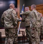 Command Sgt. Maj. Jonathan Genisio, of Orion, Illinois, receives the 129th Regiment (Regional Training Institute) regimental colors during the change of responsibility ceremony April 23 at the Illinois Military Academy, Camp Lincoln, Springfield, Illinois.