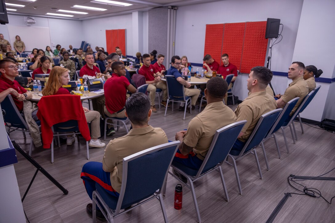 U.S. Marine Corps officers deliver instruction and answer questions during the panel portion of a Marine Corps Leadership Seminar workshop at Howard University in Washington D.C., April 21, 2023. MCLS develops greater connectedness between the Marine Corps and local university community to attract top talent for Marine Corps officer (and enlisted) programs. (U.S. Marine Corps photo by Cpl. Levi Voss)