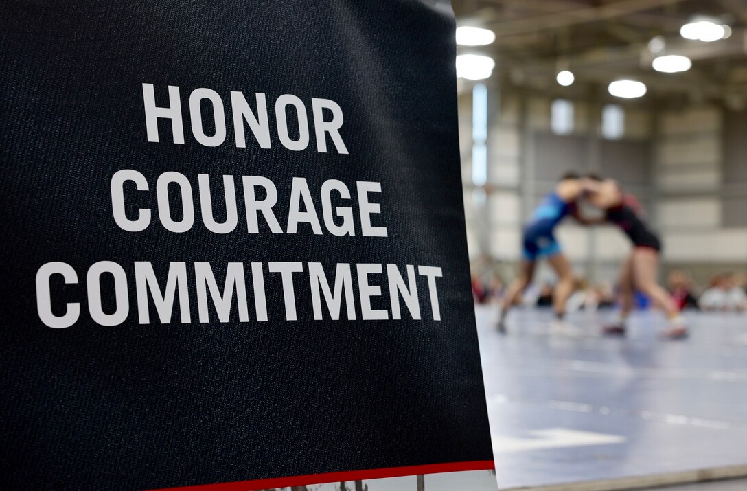 Two wrestlers battle it out on the mat at the USA Women’s Wrestling Nationals tournament in Spokane, Wash., on April 15, 2023. The Marine Corps' partnership with USA Wrestling started in 2017 as a way for Marines to develop new relationships with wrestling coaches. These partnerships ensure the coaches of the next generation of Marines are aware of Marine Corps opportunities, provide advocacy and support recruiter access to prospective audiences, which is critical to our nation's defense. (U.S. Marine Corps photo by Cpl. Levi Voss)