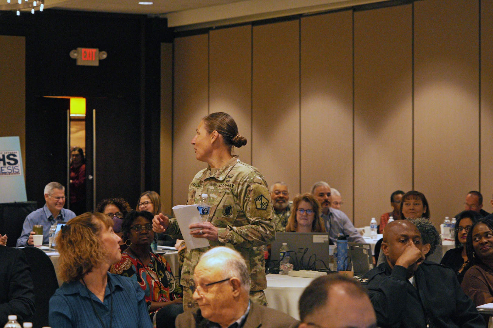 Col. Megan Stallings, USMEPCOM commander, engages with attendees at the 2023 Medical Leadership Training Symposium (MLTS).