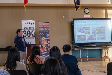 Joaquin Lainson, president, Philippine Student Association at the University of Illinois Urbana-Champaign, talks about the history of the Philippines, during the Liberation of Baguio commemoration event at the Urbana Armory April 26.
