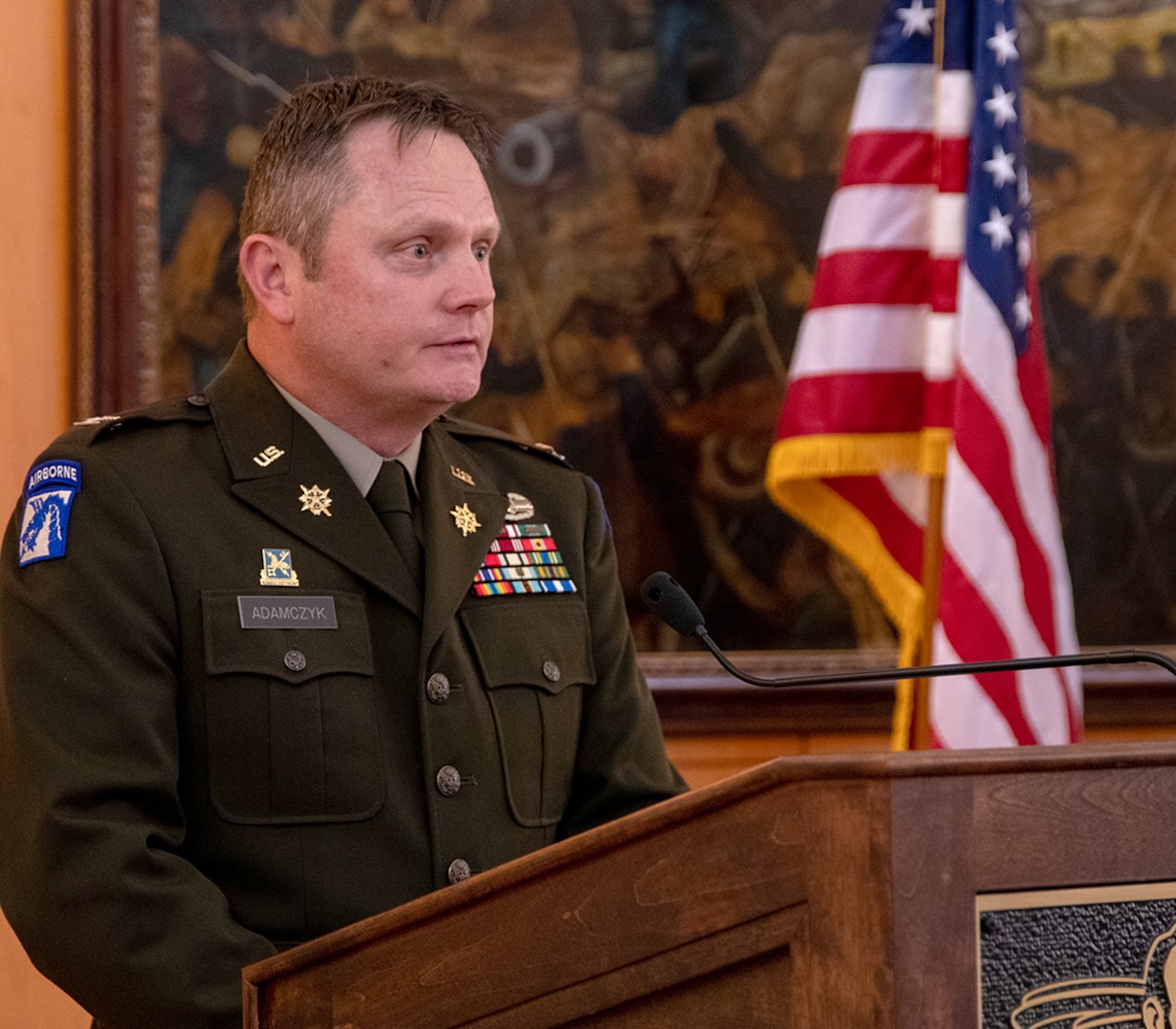 Newly promoted Illinois Army National Guard Col. Andrew Adamczyk, of Springfield, the Director of Plans, Operations and Readiness of the Joint Staff, Illinois National Guard, thanks his family and friends for their support throughout his military service at a promotion ceremony April 28 at the Abraham Lincoln Presidential Library and Museum in Springfield.