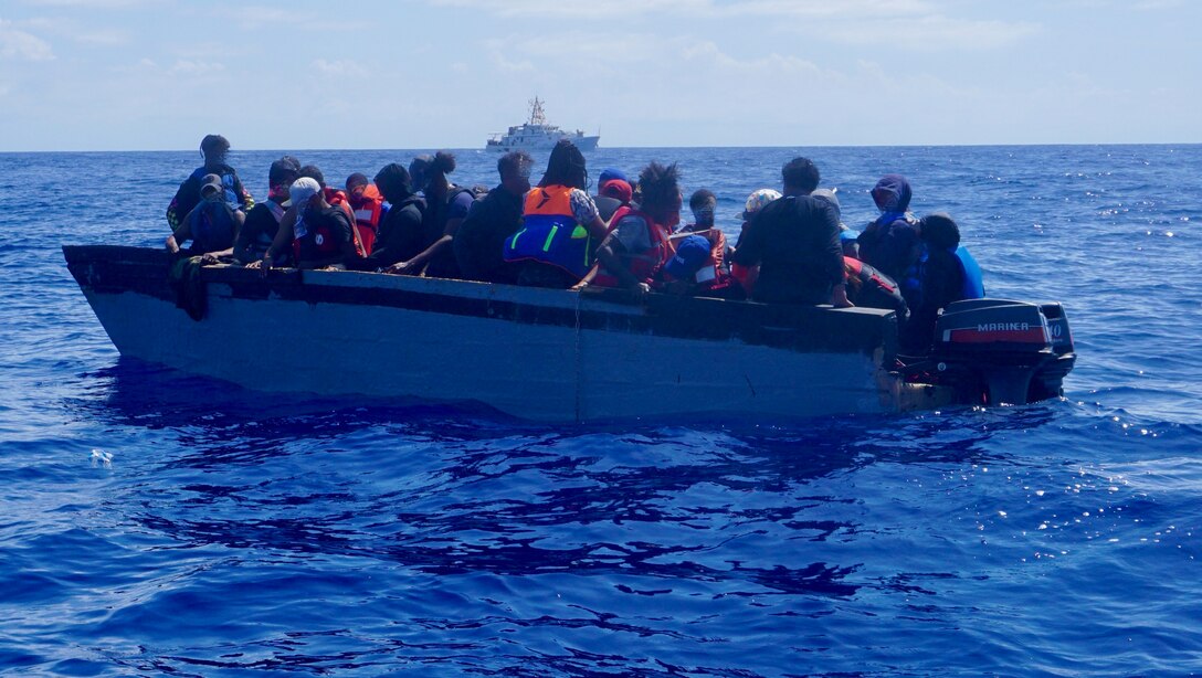 Coast Guard Cutter Joseph Napier interdicts an illegal voyage vessel with 36 migrants, 34 Dominicans and two Haitians, in Mona Passage waters northwest of Aguadilla, Puerto Rico April 30, 2023.  The migrant group was transferred to a Dominican Republic Navy vessel May 1, 2023. (U.S. Coast Guard photo)