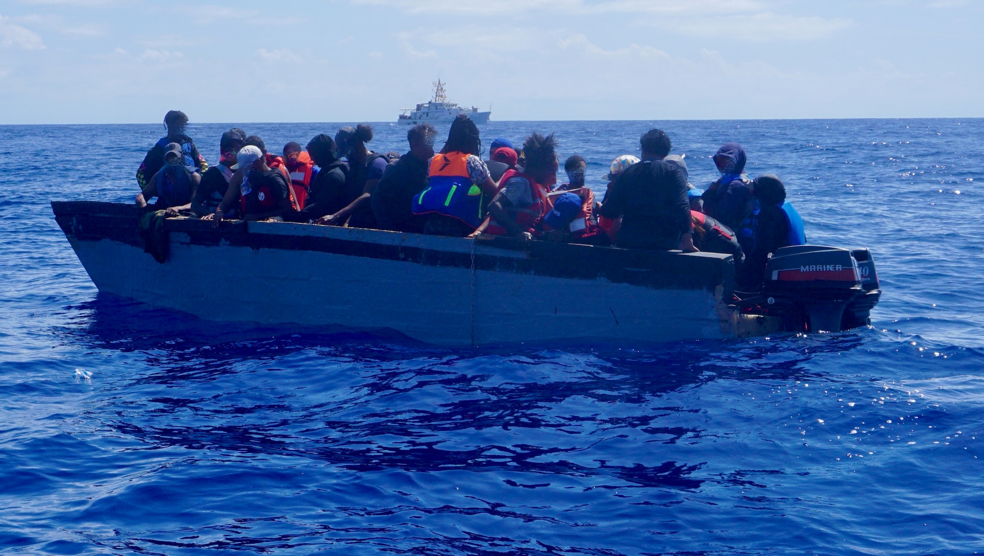 Coast Guard Cutter Joseph Napier interdicts an illegal voyage vessel with 36 migrants, 34 Dominicans and two Haitians, in Mona Passage waters northwest of Aguadilla, Puerto Rico April 30, 2023.  The migrant group was transferred to a Dominican Republic Navy vessel May 1, 2023. (U.S. Coast Guard photo)