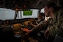 U.S. Air Force Capt. Kristie Cowan, 6th Air Refueling Squadron KC-10 Extender pilot, briefs high school Junior Reserve Officers' Training Corps cadets on the KC-10 during a Project Tuskegee, Aviation Inspiration Mentorship event at Travis Air Force Base, California, April 28, 2023. More than 400 students from the surrounding schools and universities attended an aviation-focused event with opportunities to learn from Airmen and discuss career prospects as well as tour a B-1B Lancer from Ellsworth AFB and a C-5M Super Galaxy, C-17 Globemaster III and KC-10 from Travis AFB. (U.S. Air Force photo by Nicholas Pilch)