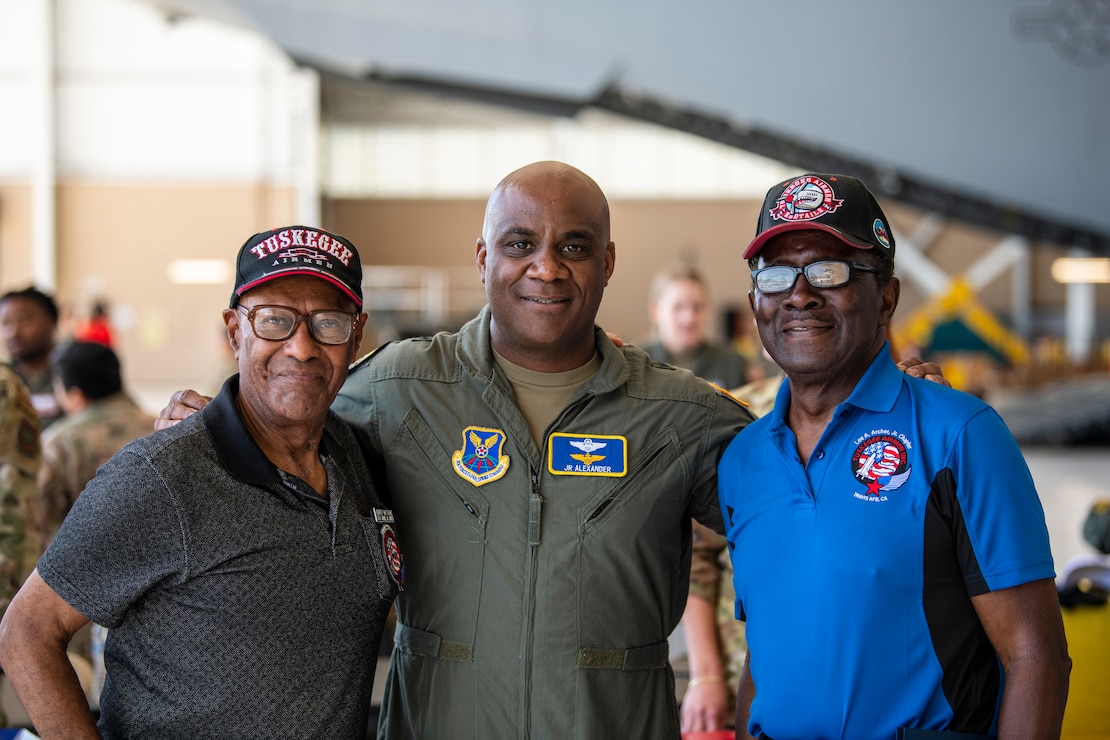 From left, Aubrey Matthews, member of the Lee A. Archer Chapter of Tuskegee Airmen Inc.; Brig. Gen. Jeffrey R. Alexander, director of Air Force Global Strike Command A5/A8 Strategic Plans, Program and Requirements, Chief of Staff of the Michigan Air National Guard, and recipient of the 2023 Black Engineer of the Year award, and another member of the Lee A. Archer Chapter of Tuskegee Airmen Inc., pose for a photo together during a Project Tuskegee, Aviation Inspiration Mentorship event at Travis Air Force Base, California, April 28, 2023. More than 400 students from the surrounding schools and universities attended an aviation-focused event with opportunities to learn from Airmen and discuss career prospects as well as tour a B-1B Lancer from Ellsworth AFB and a C-5M, C-17 Globemaster III and KC-10 from Travis AFB. (U.S. Air Force photo by Nicholas Pilch)