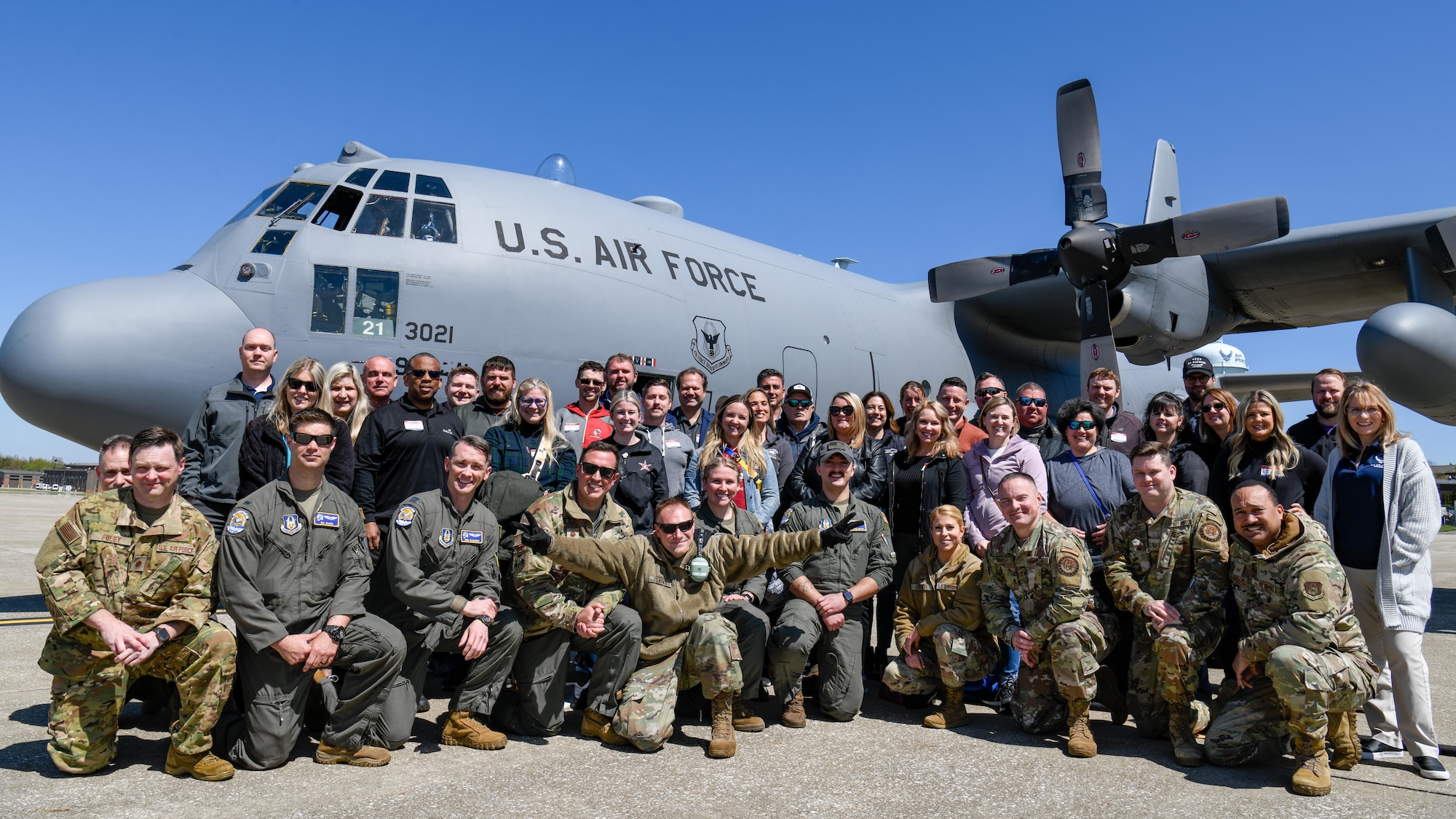 Reserve Citizen Airmen assigned to the 910th Airlift Wing and local educators from the Youngstown Air Reserve Station recruitment area pose for a group photo in front of a C-130H Hercules, April 27, 2023, at Youngstown ARS.