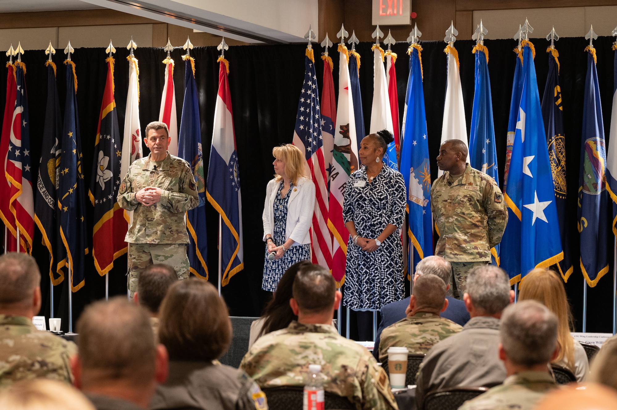 From left: U.S. Air Force Lt. Gen. Michael A. Loh, director, Air National Guard (ANG); Mrs. Dianne Loh; Mrs. Gwendolyn Williams; and Command Chief Master Sgt. Maurice L. Williams, command chief, ANG, participate in the opening ceremony of the 2023 Wing Leader Conference in Newport Beach, California, April 26, 2023.