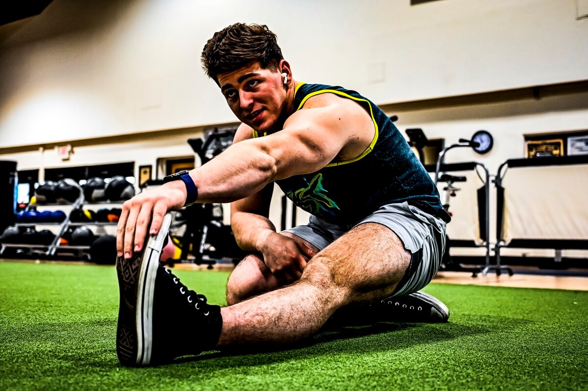 Senior Airman Austin Sondergard, 605th Aircraft Maintenance Squadron crew chief, exercises at the Griffith Field House at Joint Base McGuire-Dix-Lakehurst, N.J. Oct. 10, 2022.