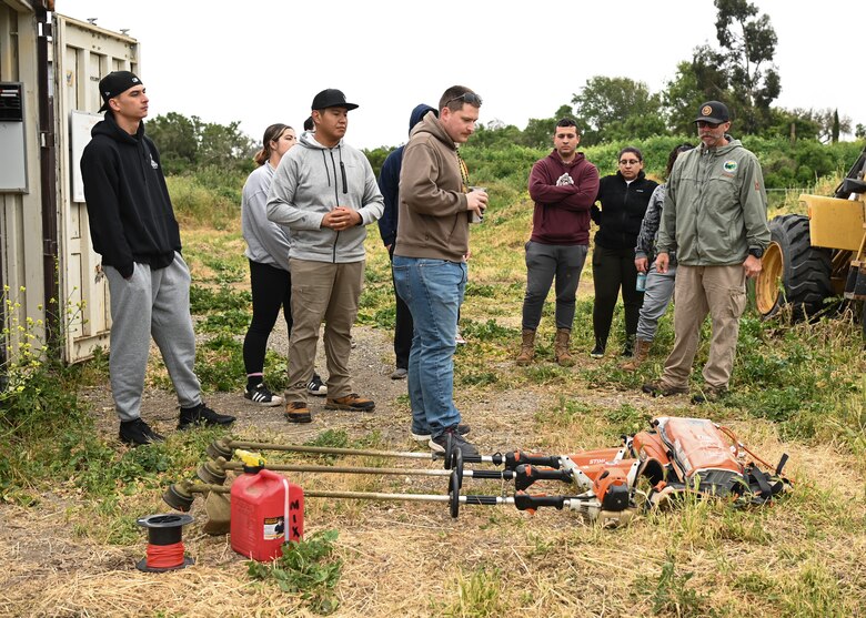 Members of Vandenberg's 30th Civil Engineer Squadron volunteers at River Bend Bike Park in Lompoc, Calif., April 28, 2023. Dave Baker briefed the volunteers on what to expect on the grounds of the bike park to help make it beautiful after the recent damage due to the rain storms. (U.S. Space Force photo by Senior Airman Tiarra Sibley)