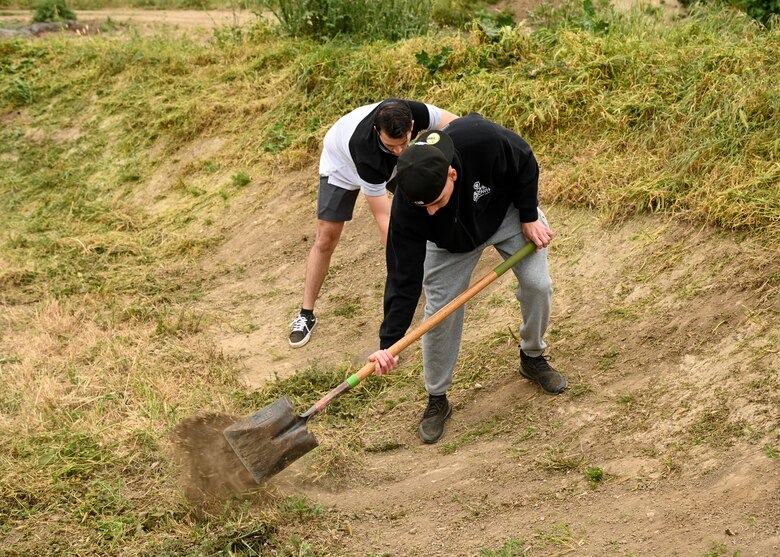 Members of Vandenberg's 30th Civil Engineer Squadron volunteers at the River Bend Bike Park in Lompoc, Calif., April 28, 2023. The members raked and pulled all unwanted weeds and rocks to help beautify the park. (U.S. Space Force photo by Senior Airman Tiarra Sibley)