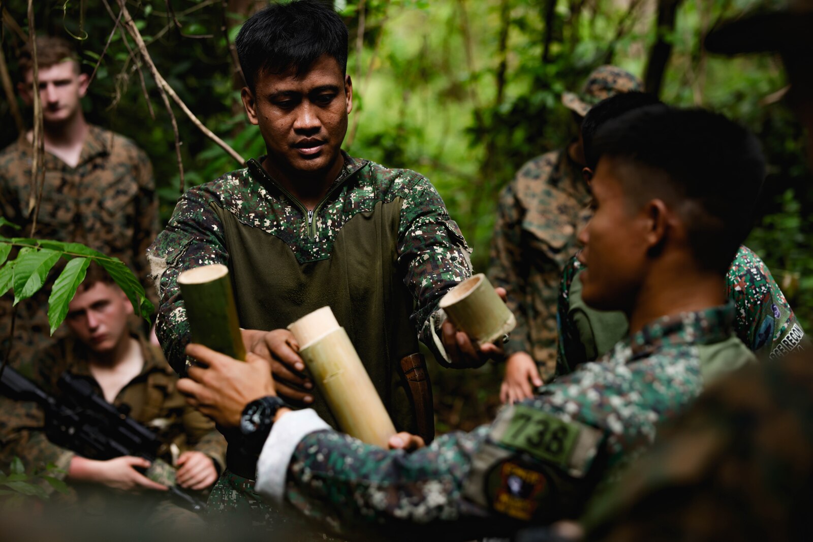 Philippine Marines with Force Reconnaissance Group teach jungle survival techniques to U.S. Marines and Sailors with 3d Reconnaissance Battalion, 3d Marine Division during Balikatan 23 at Marine Base Gregorio Lim, Philippines, April 14, 2023. Balikatan 23 is the 38th iteration of the annual bilateral exercise between the Armed Forces of the Philippines and the U.S. military. The exercise includes three weeks of training focused on amphibious operations, command and control, humanitarian assistance, urban operations and counterterrorism skills throughout northern and western Luzon. Coastal defense training figures prominently in the Balikatan 23 training schedule.
