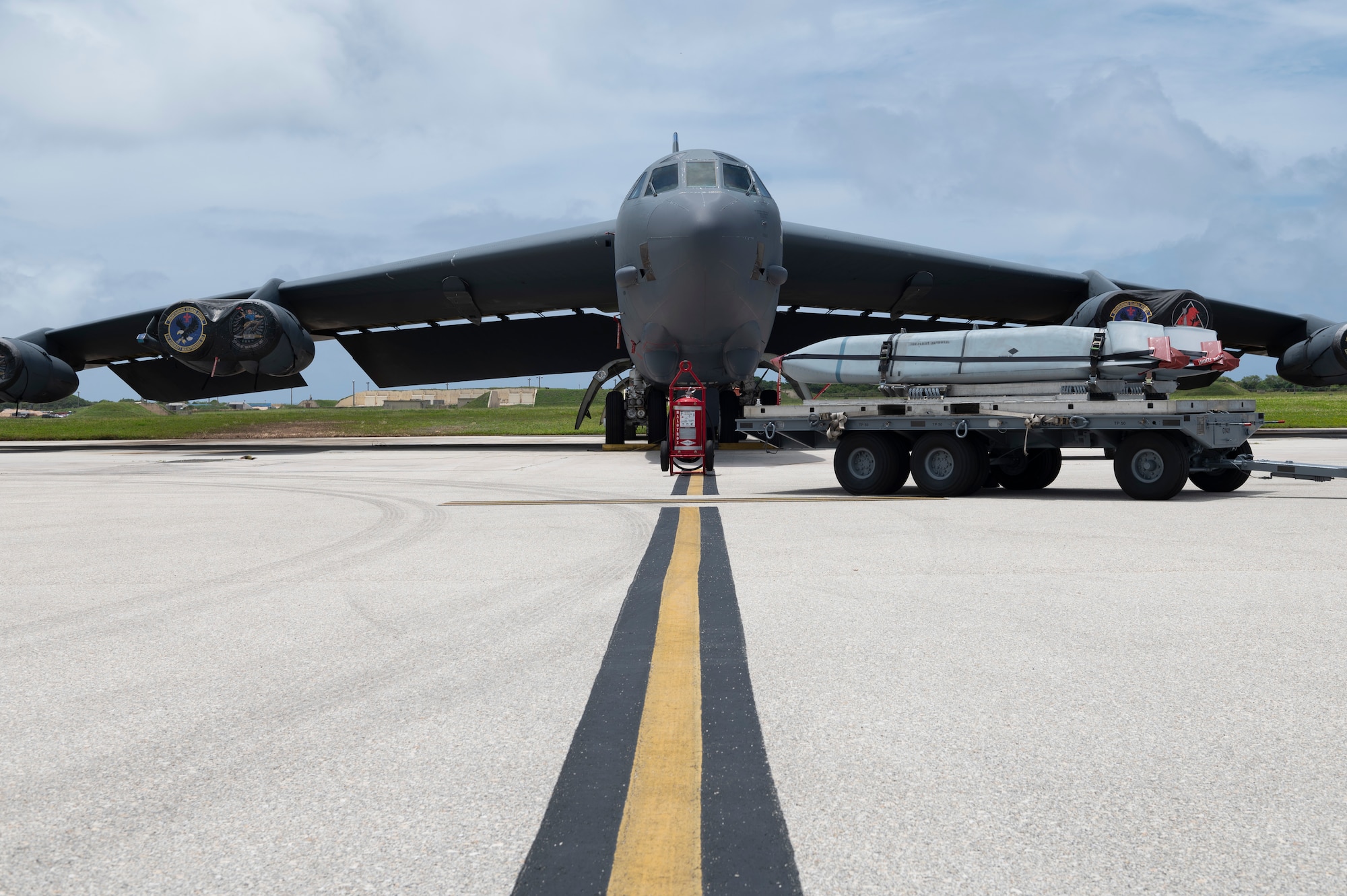 Joint Air to Surface Standoff Missiles are prepared to be loaded on to a U.S. Air Force B-52 Stratofortress on Andersen Air Force Base, Guam, April 24, 2023. The JASSM missile system is a weapons system capable of striking ground targets from extended ranges, making it a key deterrent against aggression across the Pacific. (U.S. Air Force photo by Airman 1st Class Spencer Perkins)