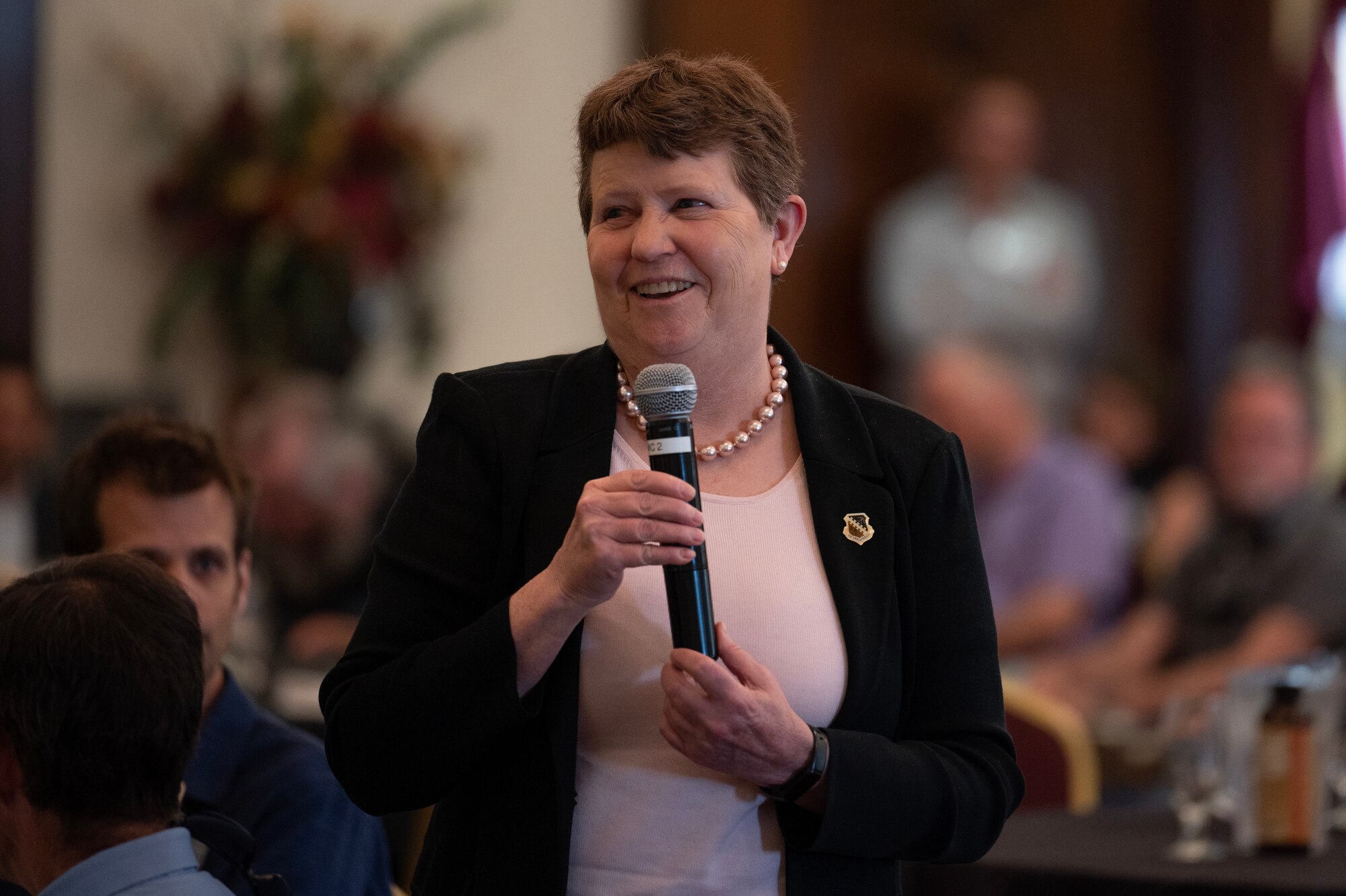 Woman speaks at a digital engineering workshop