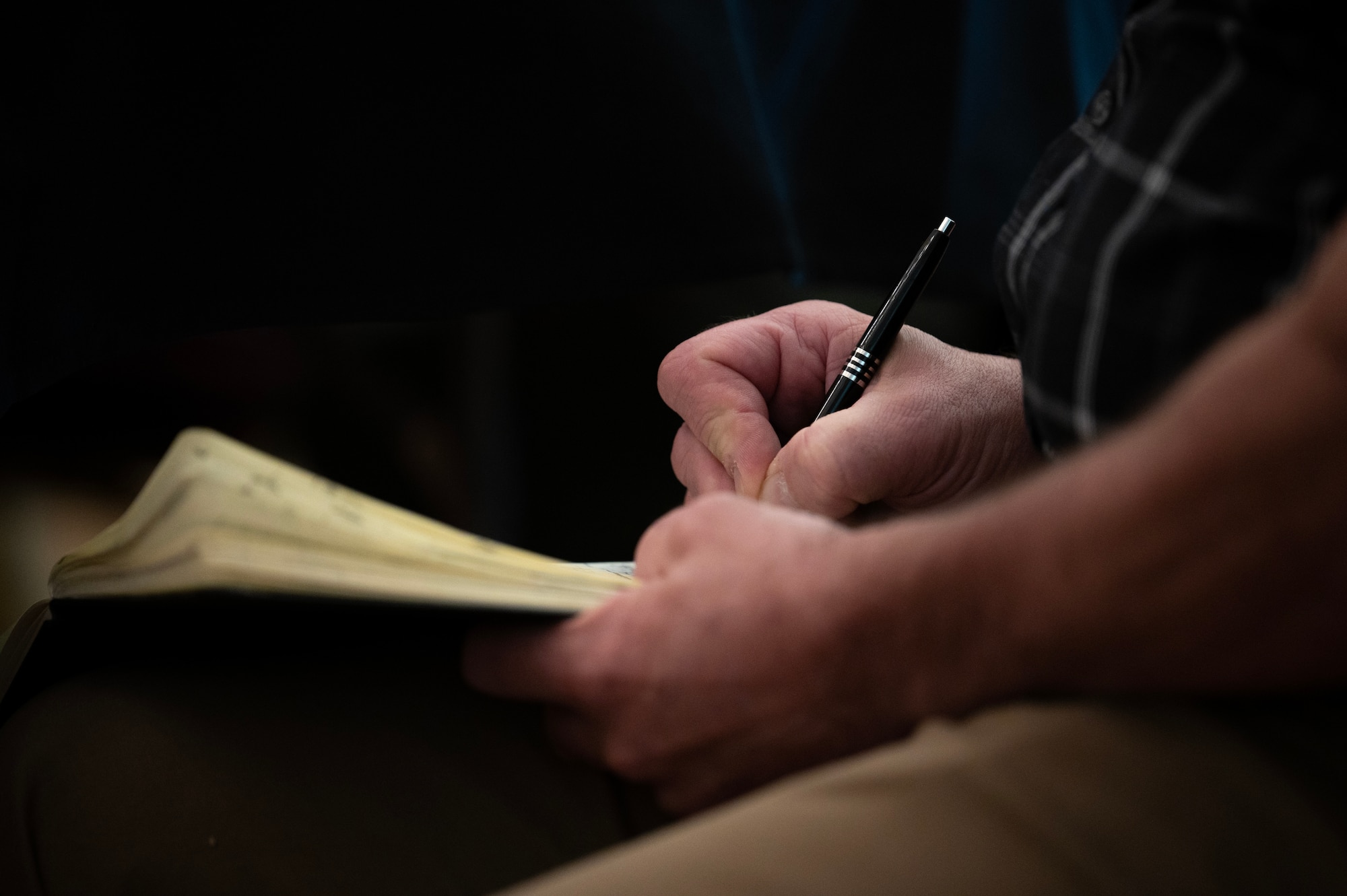 A man takes notes at a digital engineering workshop