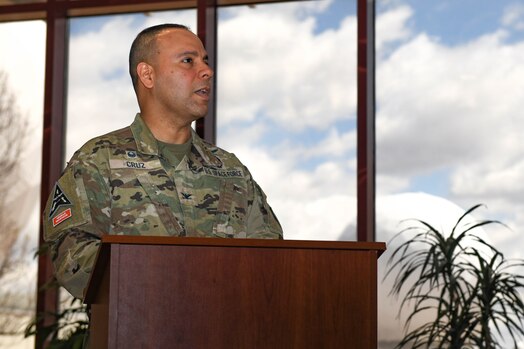  A man speaks at a podium.