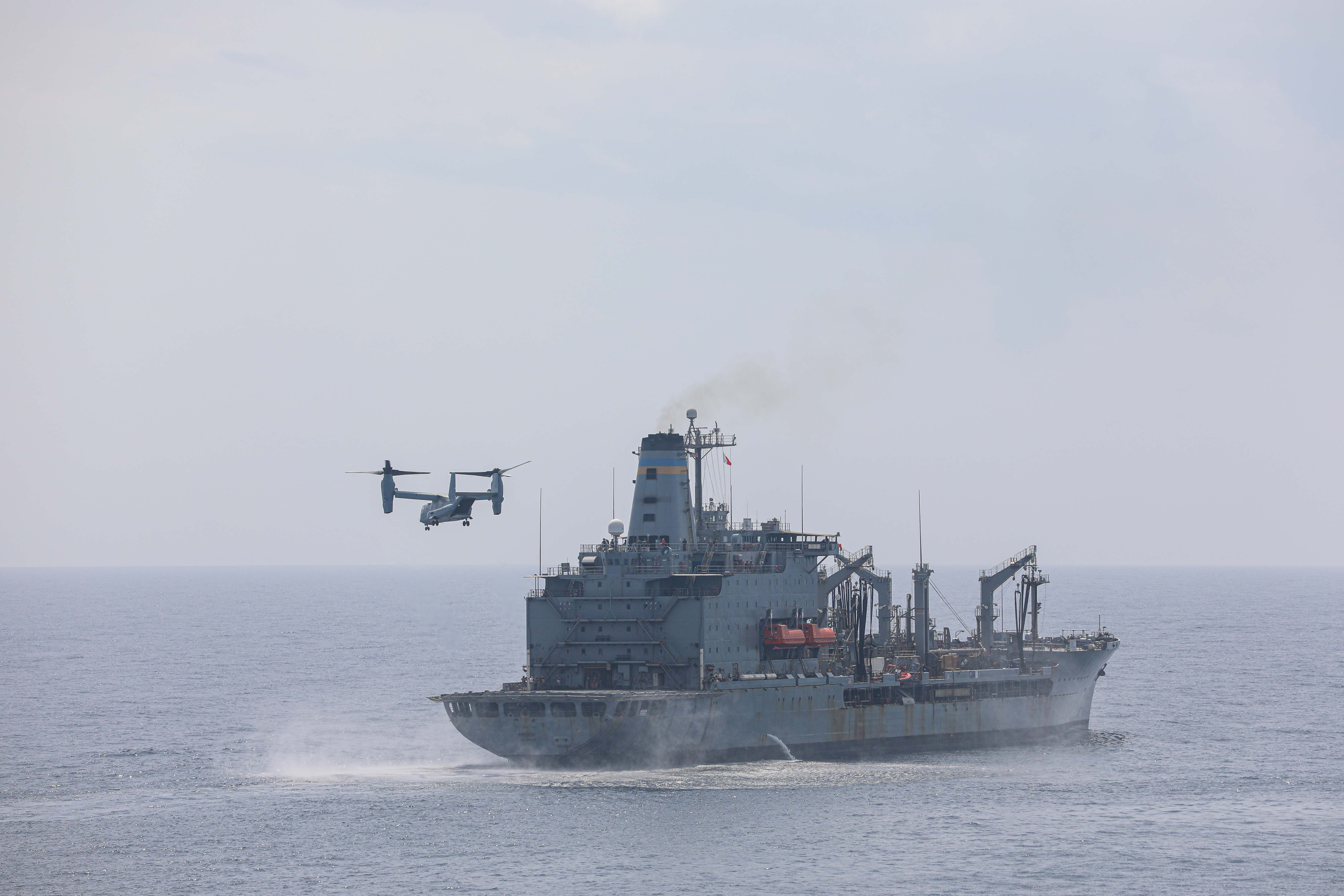 An MV-22B Osprey, assigned to Marine Medium Tilt Rotor Squadron 162 (Reinforced), departs the fleet replenishment oiler USNS Patuxent (T-AO 201) during visit, board, search and seizure drills in the Atlantic Ocean.