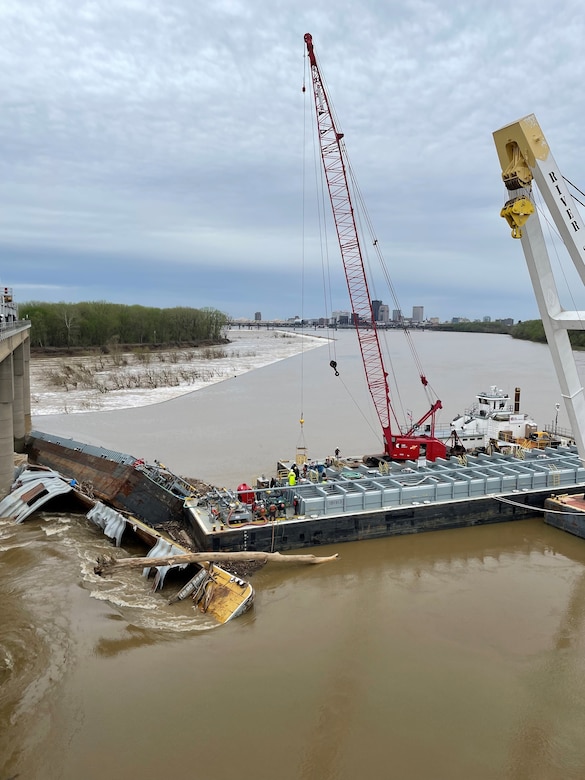 Salvage crews perform lightering operation