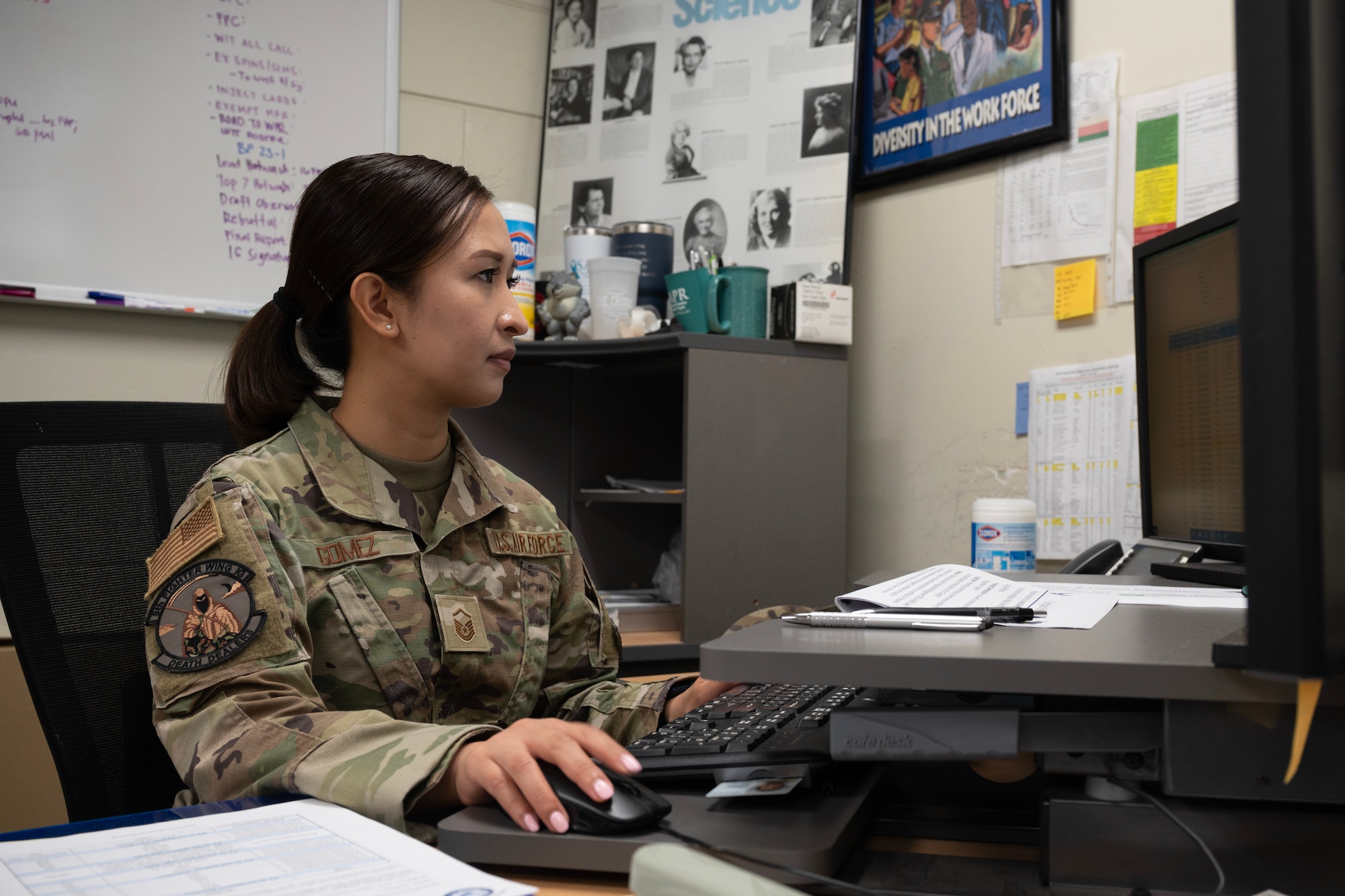 Woman works on computer
