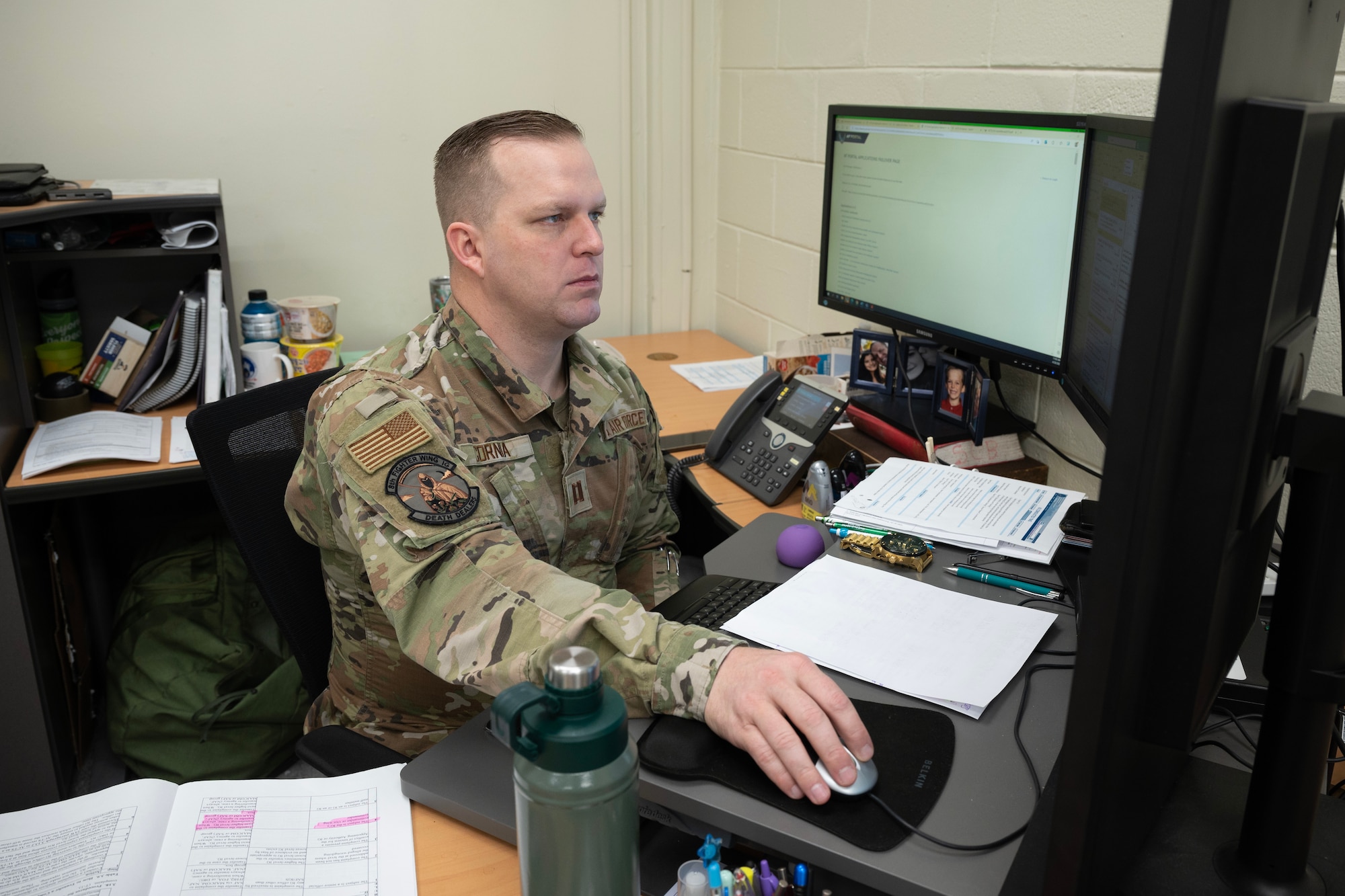 Man works on computer