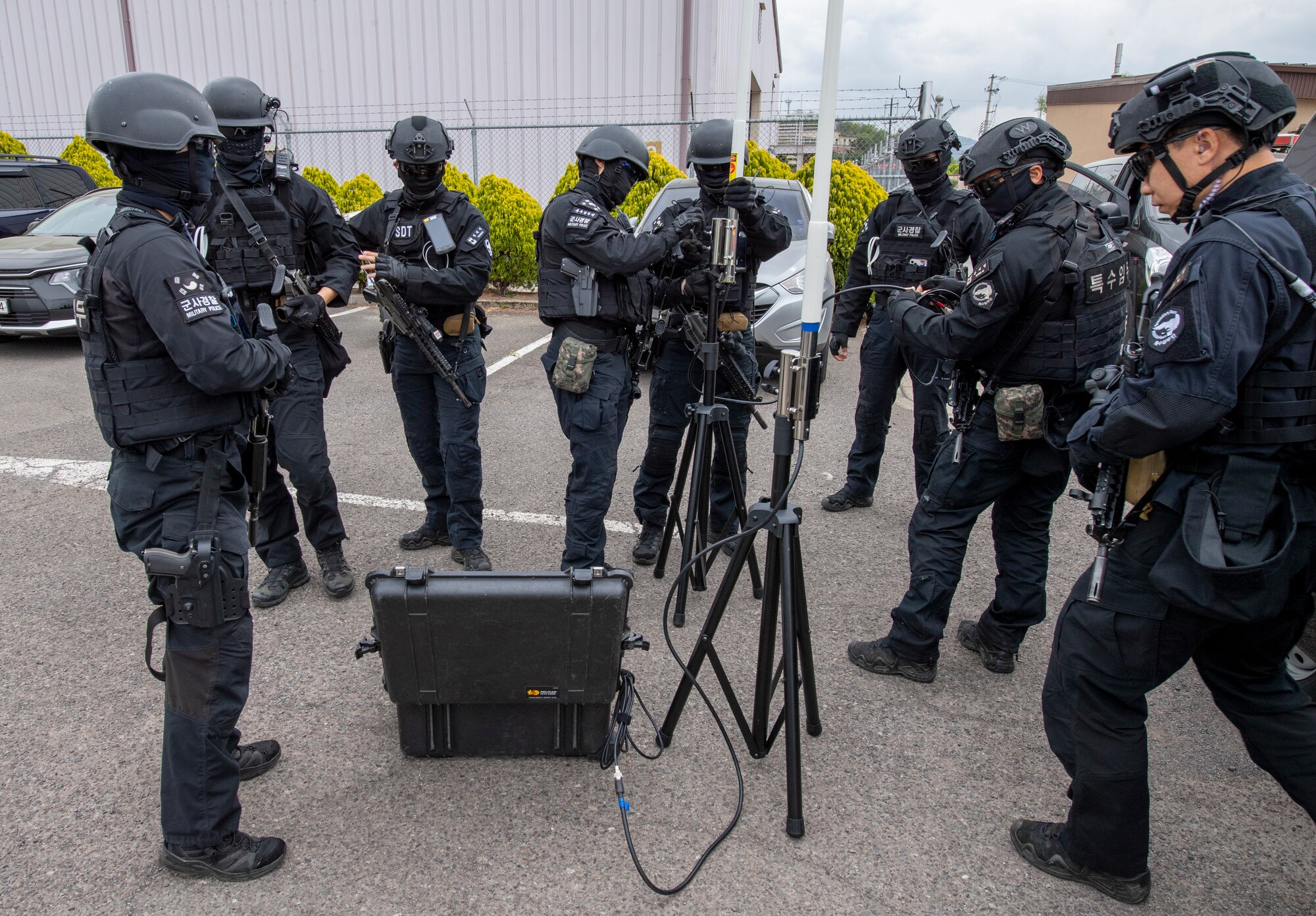 Republic of Korea Air Force military police members set up an impromptu mobile communication center during an active shooter training event at Daegu Air Base, ROK, April 24, 2023. Communication equipment helps leadership and on-scene commanders keep in touch with first responders during emergency situations. (U.S. Air Force photo by Airman 1st Class Aaron Edwards)