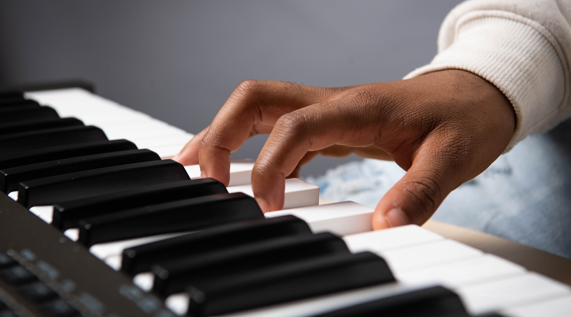 U.S. Air Force Airman Matthew Louis, 86th Logistics Readiness Squadron inventory apprentice, plays the piano at Ramstein Air Base, Germany, April 21, 2023. Louis’ parents began teaching him to play the piano when he was only eight-years-old. (U.S. Air Force photo by Airman 1st Class Jared Lovett)