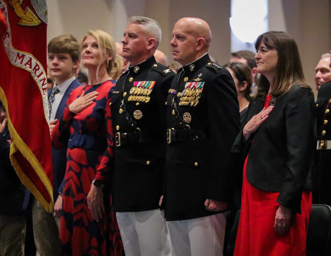 General David H. Berger, 38th Commandant of the Marine Corps, and Col. Robert A. Sucher, commanding officer of Marine Barracks Washington, stand at attention for the playing of the national anthem during the first parade of the 2023 season at Marine Barracks Washington, D.C., Apr, 28, 2023. Col. Robert A. Sucher, was the hosting official, and Gen. David H. Berger, was the guest of honor. (U.S. Marine Corps photo by Lance Cpl. Pranav Ramakrishna)