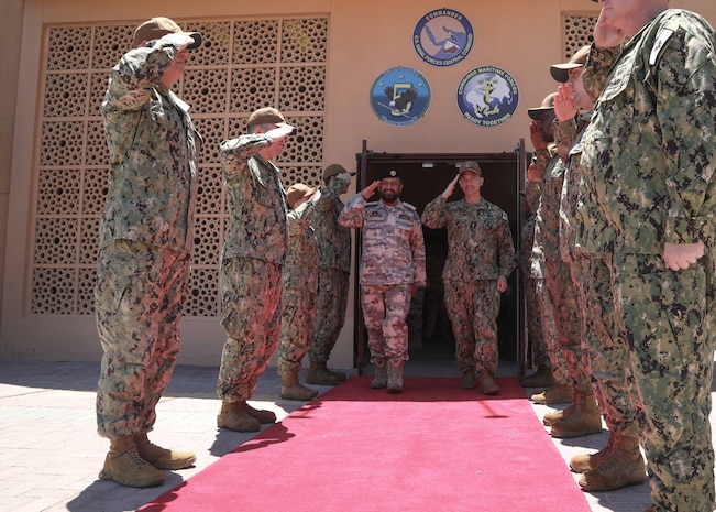 MANAMA, Bahrain (May 2, 2023) Vice Adm. Brad Cooper, commander of U.S. Naval Forces Central Command, U.S. 5th Fleet and Combined Maritime Forces, and Commander of the Qatari Emiri Navy Maj. Gen. Abdullah Hassan Al-Sulaiti salute while departing U.S. 5th Fleet headquarters in Manama, Bahrain, May 2, 2023.