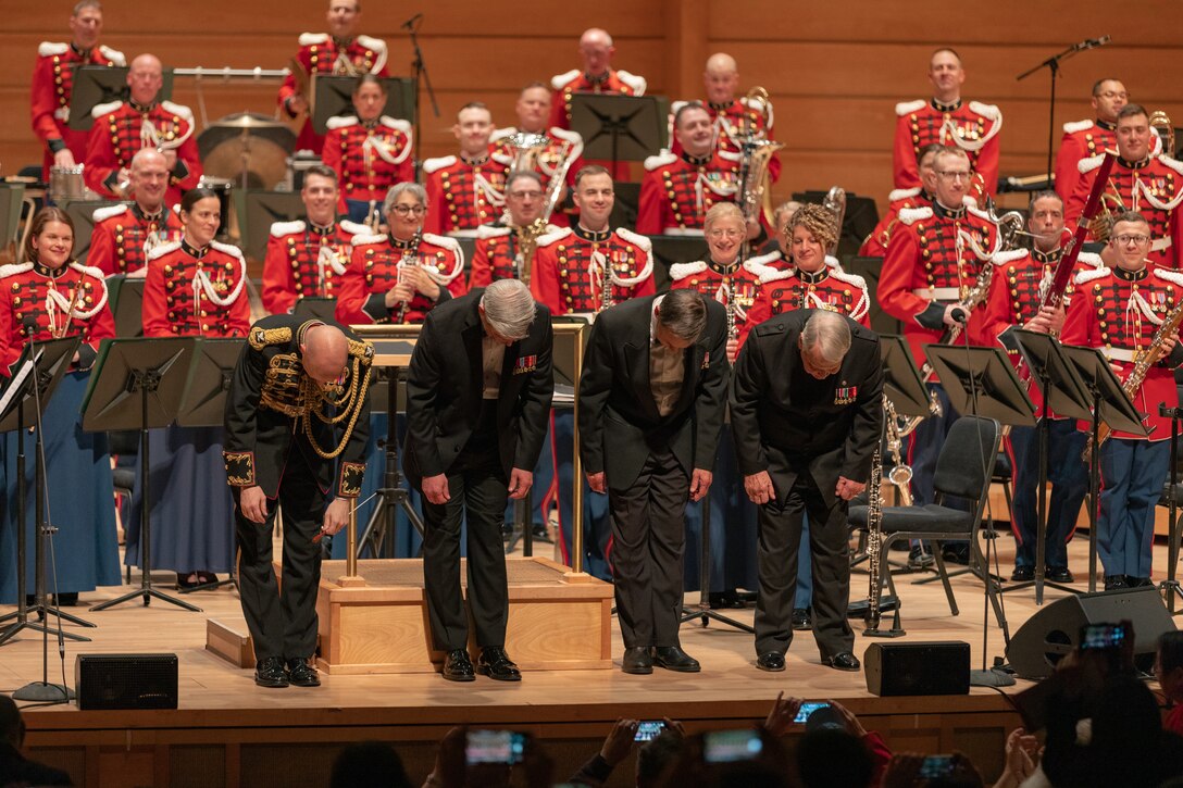 Pictured left to right: Col. Jason Fettig, Col. Michael Colburn, Col. Timothy Foley and Col. John Bourgeois bow at the conclusion of the Marine Band's 225th anniversary concert held in North Bethesda, Md. on April 30, 2023.

(U.S. Marine Corps photos by SSgt. Chase Baran/Released)