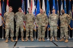 From left: U.S. Air Force Lt. Gen. Michael A. Loh, director, Air National Guard; Staff Sgt. Dhruva Poluru, 107th Attack Wing, New York National Guard; Tech. Sgt. Jessica R. Brazionis, 110th Wing, Michigan National Guard; Senior Master Sgt. Tony K. Hall, 145th Airlift Wing, North Carolina National Guard; Master Sgt. Joshua R. Johnson, 140th Wing, Colorado National Guard; and Command Chief Master Sgt. Maurice L. Williams, command chief, ANG, during an Outstanding Airmen of the Year ceremony at the 2023 Wing Leader Conference in Newport Beach, California, April 26, 2023. The winners were recognized for superior leadership, job performance and overall excellence.