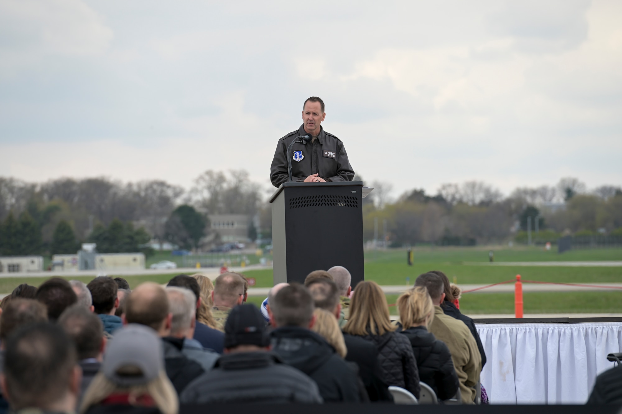U.S. Air Force Col. Bart Van Roo, the commander of the Wisconsin Air National Guard's 115th Fighter Wing, addresses the audience Apr. 25, 2023, during an F-35 arrival ceremony at Truax Field in Madison, Wisconsin.