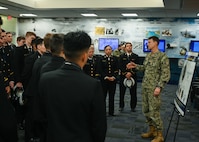 Midshipmen from the U.S. Naval Academy Information Warfare Club visit the Office of Naval Intelligence.