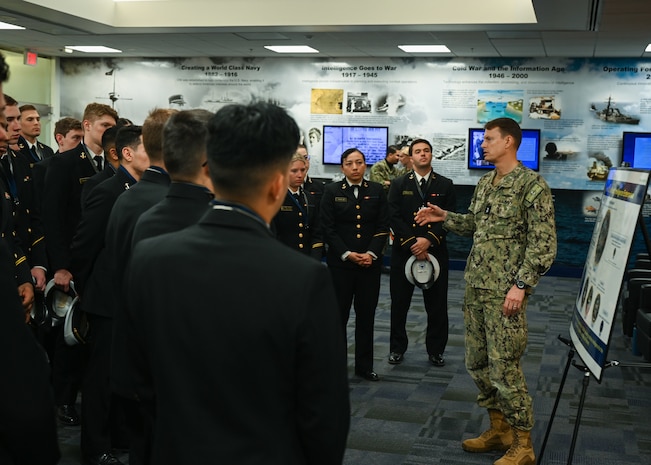 Midshipmen from the U.S. Naval Academy Information Warfare Club visit the Office of Naval Intelligence.