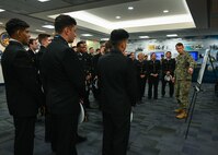 Midshipmen from the U.S. Naval Academy Information Warfare Club visit the Office of Naval Intelligence.