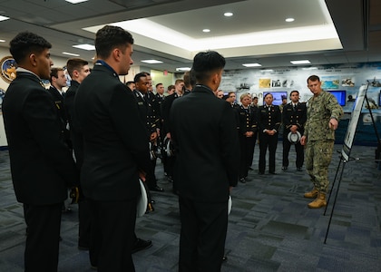 Midshipmen from the U.S. Naval Academy Information Warfare Club visit the Office of Naval Intelligence.