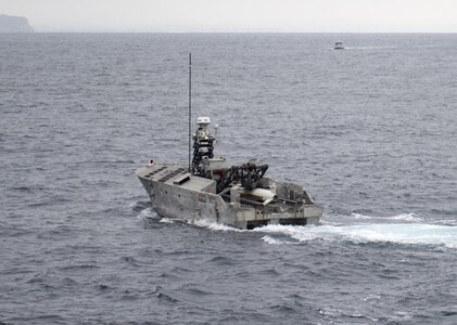 Mine Countermeasures Unmanned Surface Vehicle (MCM USV) in Minehunt configuration completes sortie modes, including shallow and deep search, pruning, and Electro-Optic Identification (EOID).