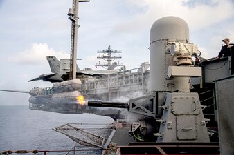 USS Nimitz (CVN 68)  fires a Mark 15 Phalanx close-in weapon system during a weapons readiness exercise in the South China Sea.