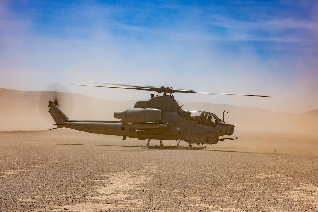 A U.S. Marine Corps AH-1Z Viper with Marine Light Attack Helicopter Squadron (HMLA) 367, Marine Aircraft Group 39, 3rd Marine Aircraft Wing, conducts training during National Training Center Rotation 23-07 at Fort Irwin, California, April 27, 2023. During the exercise, HMLA-367 supported 75th Ranger Regiment and 3/160th Special Operations Aviation Regiment (SOAR) as the sole rotary-wing fire support element, enhancing joint planning and execution of long-range assault force escort, deep and close air support, and direct-action raids. (U.S. Marine Corps photo by Lance Cpl. Alexander O. Devereux)