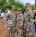 1st Lt. Anna Zaccaria (center) poses with her mentor SSG Jeremy Dornbusch (left) and Cpt. Ignacio Naudon (right) while celebrating after her Army Ranger School graduation ceremony at Fort Benning, GA, April 28, 2023.