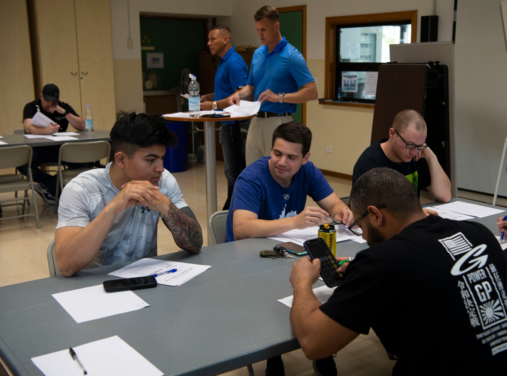 U.S. Air Force service members and civilians participate in a spiritual fitness discussion during Wyvern Way Day.