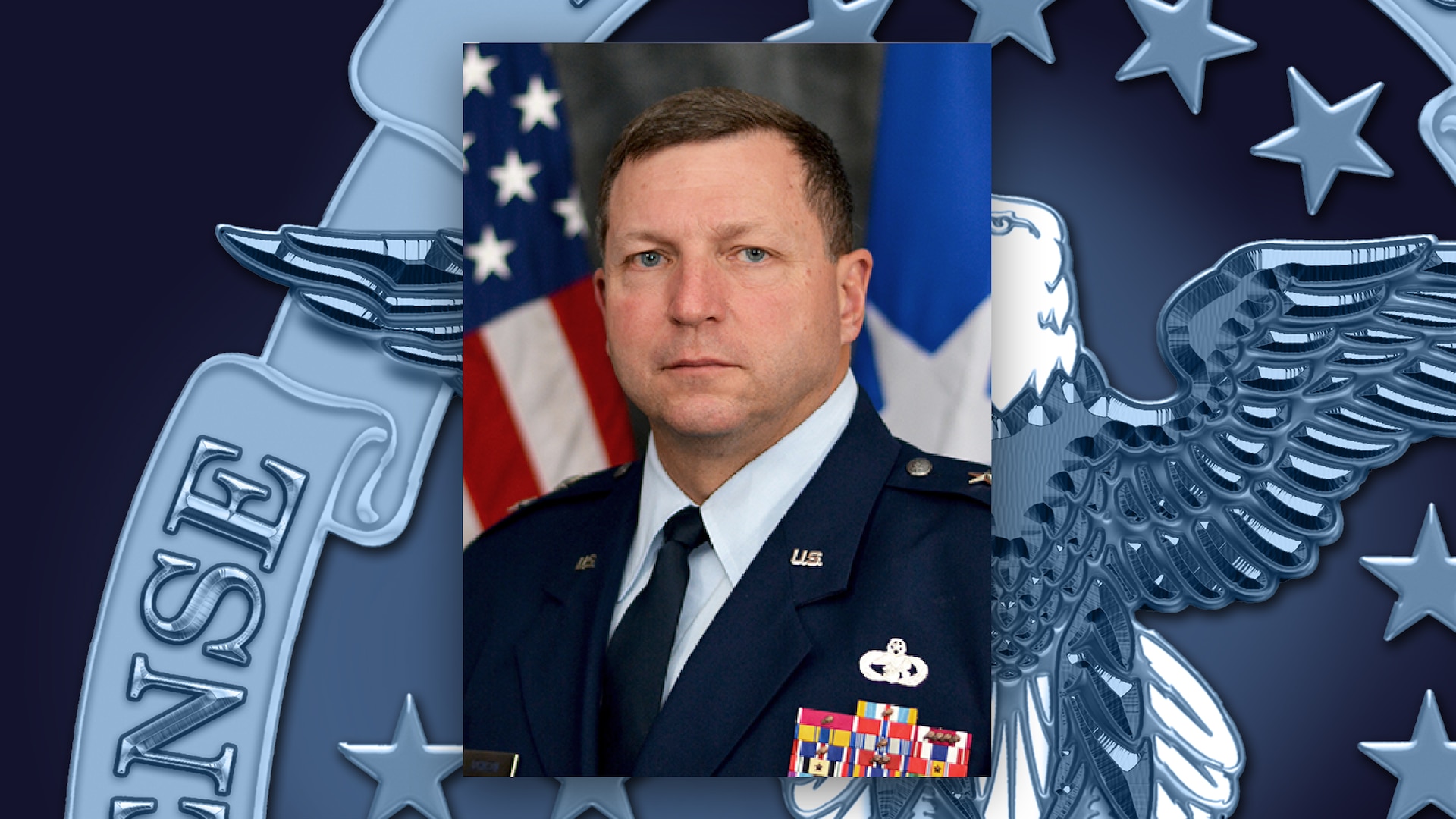 A portrait of Air Force Maj. Gen. Mark Johnson on a DLA emblem background