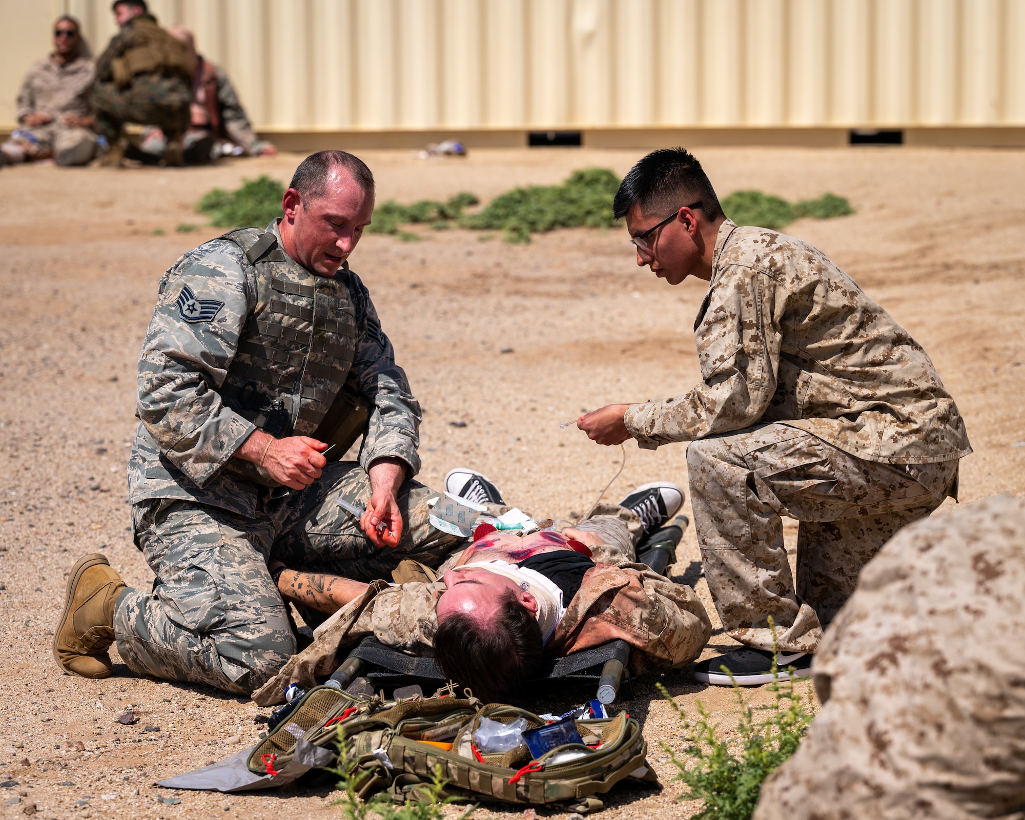 U.S. Air Force 1st Lt. Shane Mikolajewki, 81st Medical Group healthcare specialist, performs simulated Tactical Combat Casualty Care during an exercise April 26, 2023, at Luke Air Force Base, Arizona.