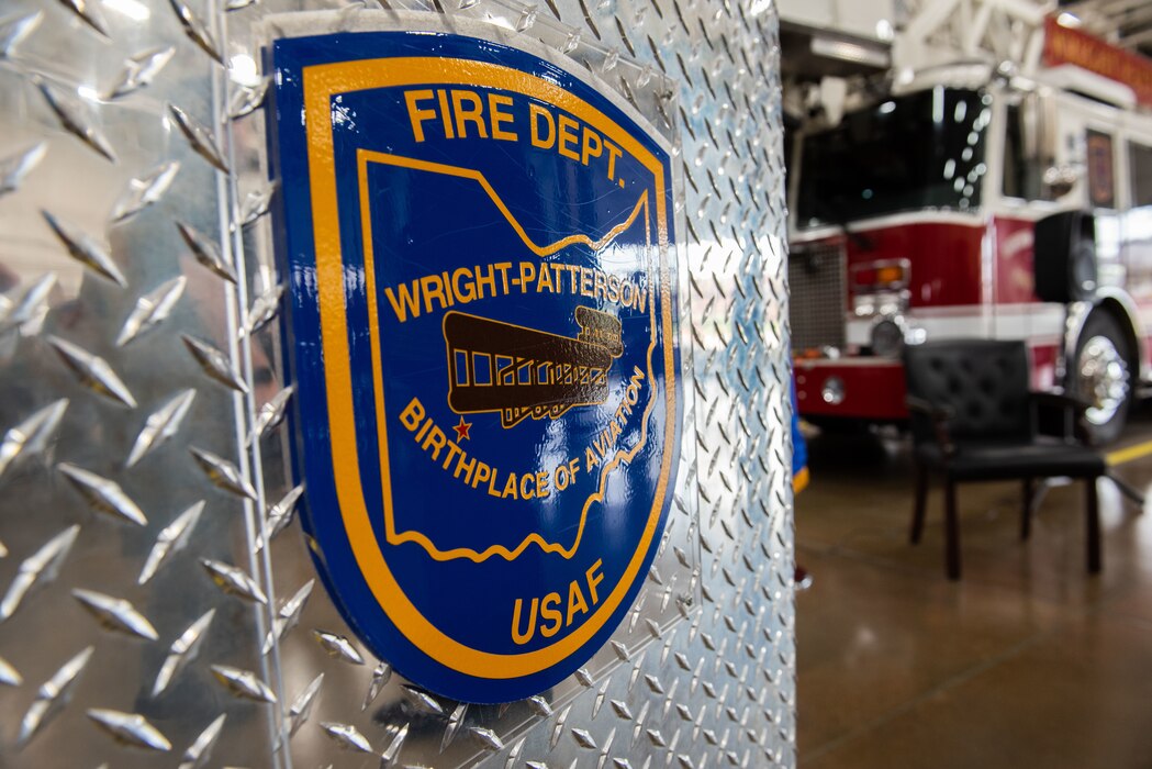 The Wright-Patterson Air Force Base Fire Department celebrates as Jacob King, WPAFB Fire Chief, retires after a 27-year civilian service career to the Air Force April 28, 2023, at Wright-Patterson Air Force Base, Ohio. (U.S. Air Force photo by Darrius Parker)