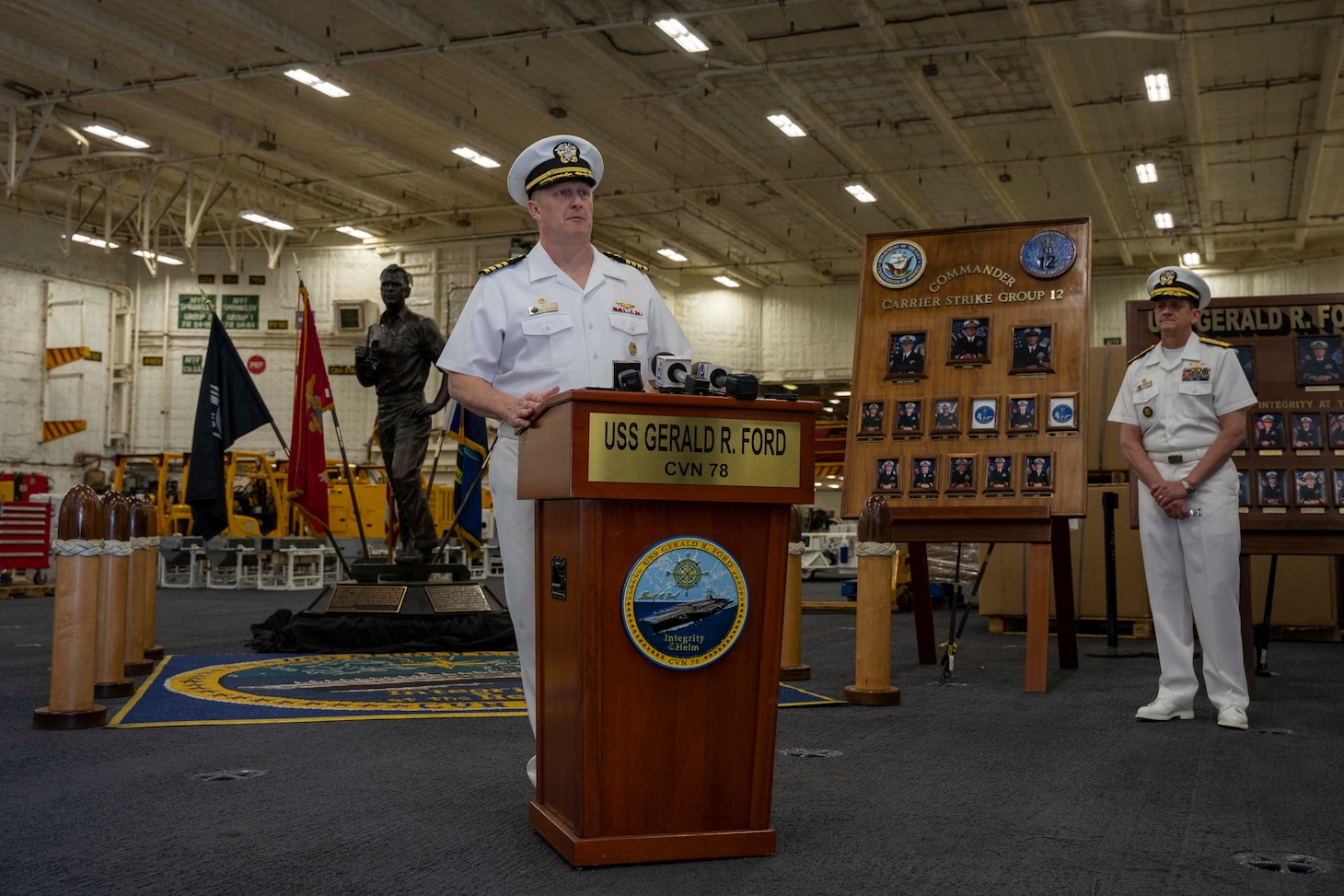 Capt. Rick Burgess, commanding officer of the first-in-class aircraft carrier USS Gerald R. Ford (CVN 78), speaks to media about the upcoming deployment aboard the Ford, May 2.