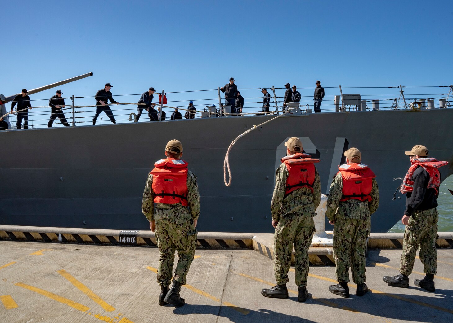 Sailors assigned to the Arleigh Burke-Class guided missile destroyer, USS Ramage (DDG 61), prepare to depart Naval Station Norfolk for deployment, May, 2, 2023.