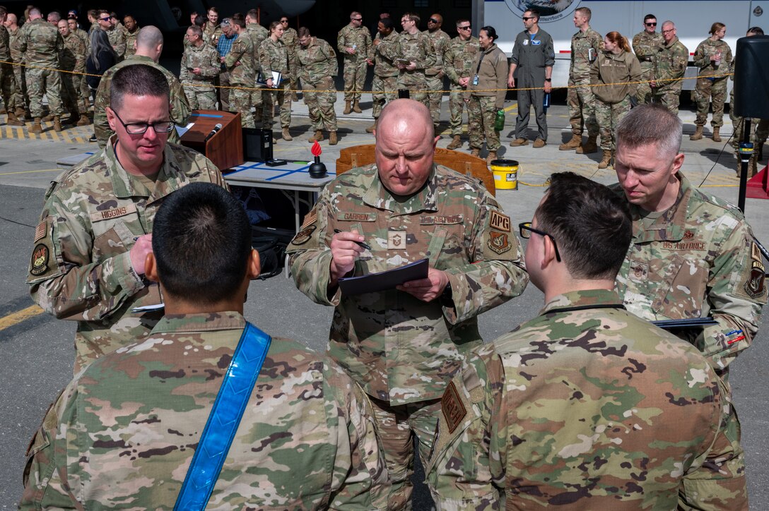 A photo of Airmen being quizzed during a competition