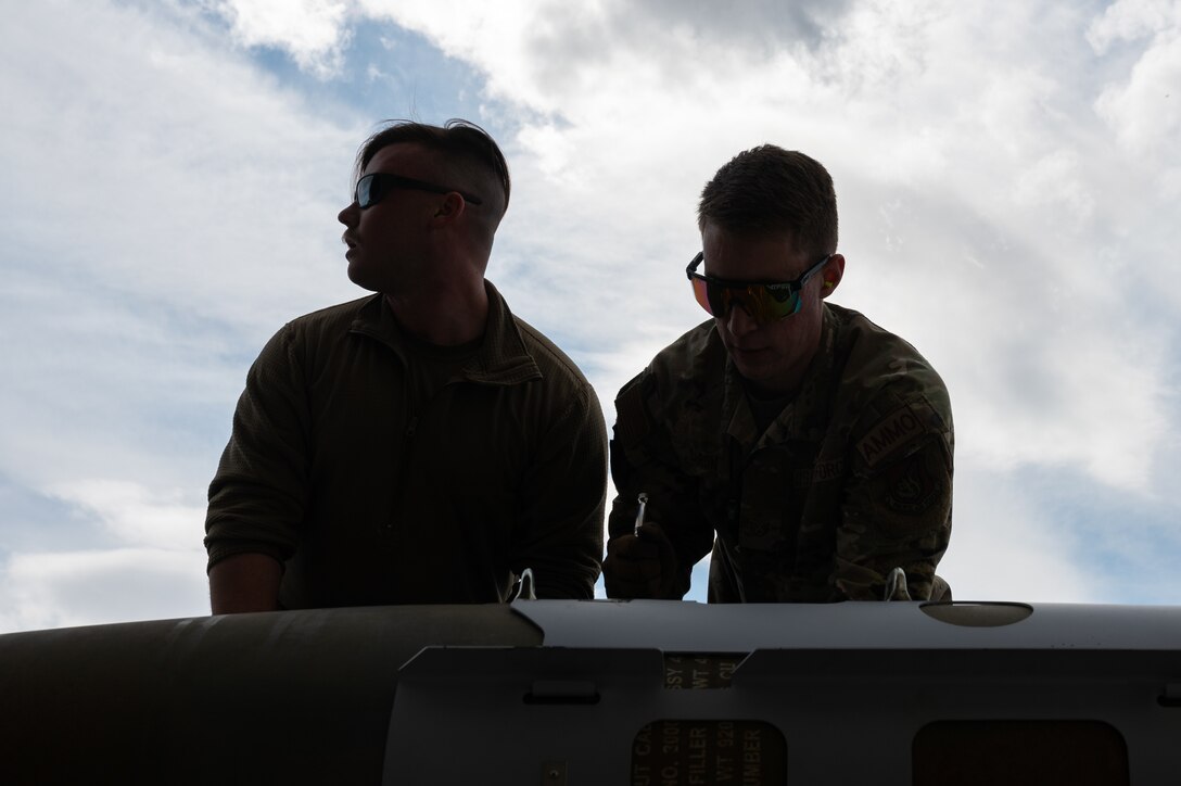 A photo of Airmen building a bomb