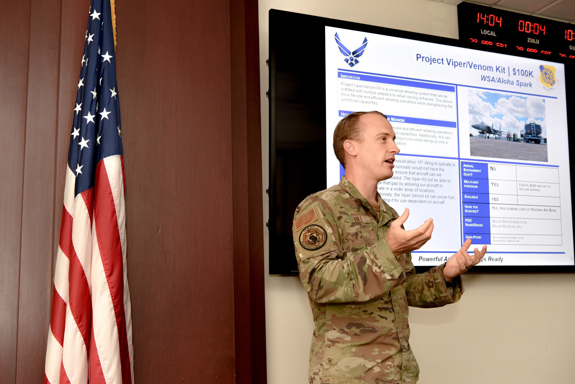 U.S. Air Force Maj. Raymond Hill, Pacific Air Forces Innovation Lead, pitches his idea to 15th Wing leadership during the inaugural 15th Wing Spark Tank competition on Joint Base Pearl Harbor-Hickam, Hawaii, April 28, 2023.