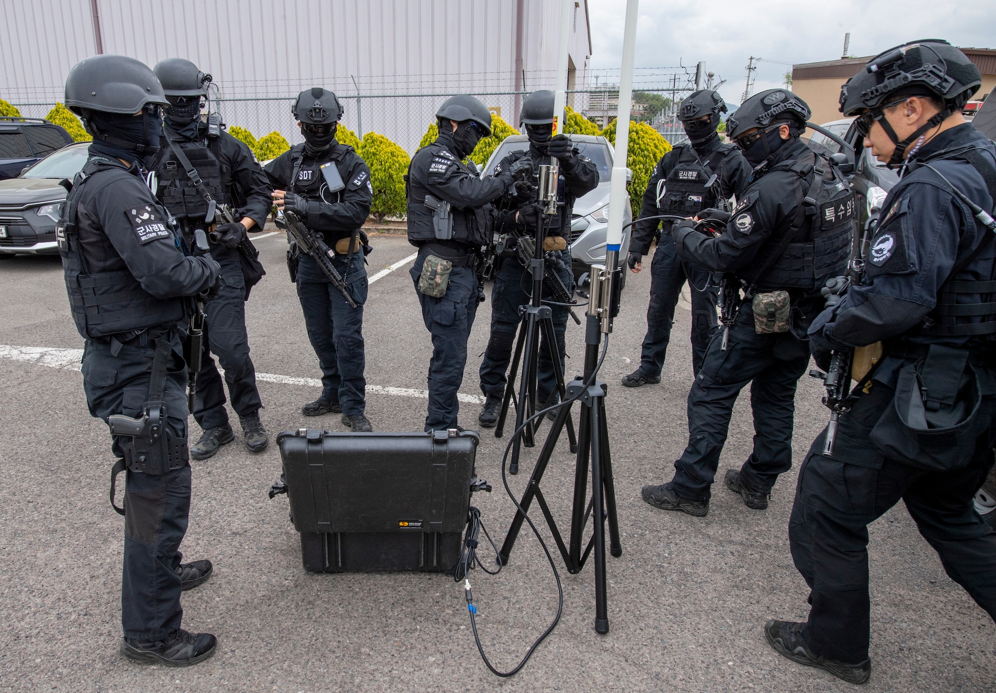 Republic of Korea Air Force military police members set up an impromptu mobile communication center during an active shooter training event at Daegu Air Base, ROK, April 24, 2023. Communication equipment helps leadership and on-scene commanders keep in touch with first responders during emergency situations. (U.S. Air Force photo by Airman 1st Class Aaron Edwards)